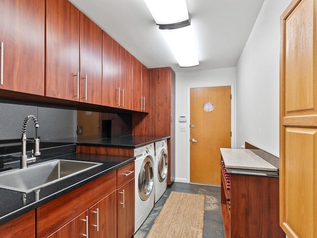 3905 Country View Dr, Sarasota, FL 34233 - laundry room with washing machine and clothes dryer, cabinet space, and dark stone finish floors