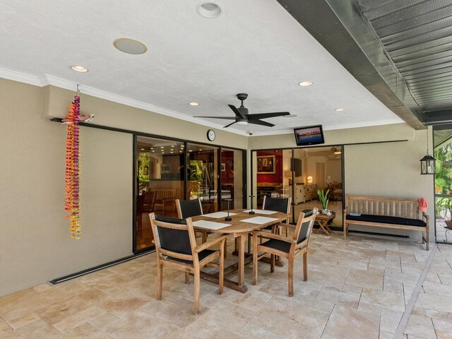 3905 Country View Dr, Sarasota, FL 34233 - dining room featuring recessed lighting, stone tile flooring, a ceiling fan, and ornamental molding