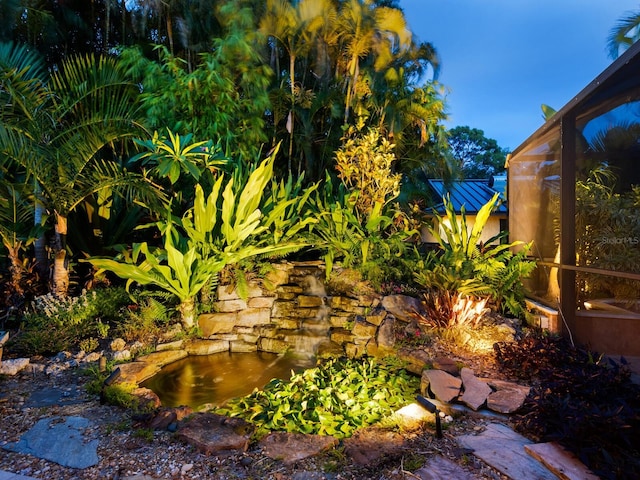 3905 Country View Dr, Sarasota, FL 34233 - view of yard featuring a garden pond