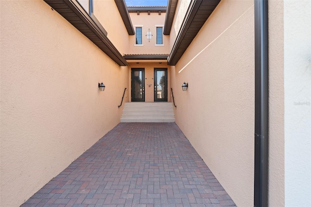 10820 Tarflower Dr Unit 202, Venice, FL 34293 - view of exterior entry featuring stucco siding