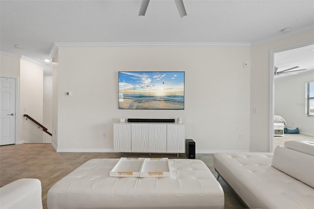 10820 Tarflower Dr Unit 202, Venice, FL 34293 - living area featuring ceiling fan, crown molding, and baseboards