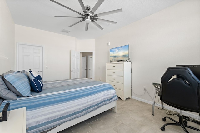 10820 Tarflower Dr Unit 202, Venice, FL 34293 - bedroom featuring a desk, a ceiling fan, and baseboards