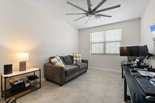 10820 Tarflower Dr Unit 202, Venice, FL 34293 - home office featuring a ceiling fan, baseboards, and light tile patterned flooring