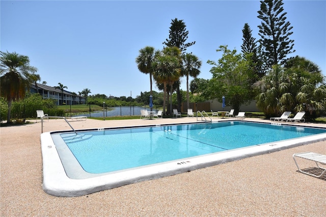 2729 Hidden Lake Blvd Unit D, Sarasota, FL 34237 - community pool featuring a patio