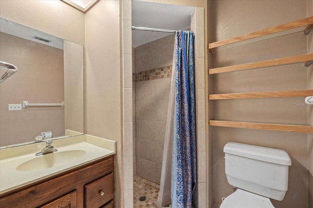 6207 Courtside Dr Unit 23, Bradenton, FL 34210 - full bathroom featuring a shower stall, toilet, and vanity