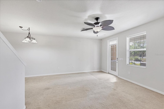 3760 82nd Avenue Cir E Unit 102, Sarasota, FL 34243 - spare room with light colored carpet, ceiling fan, and baseboards