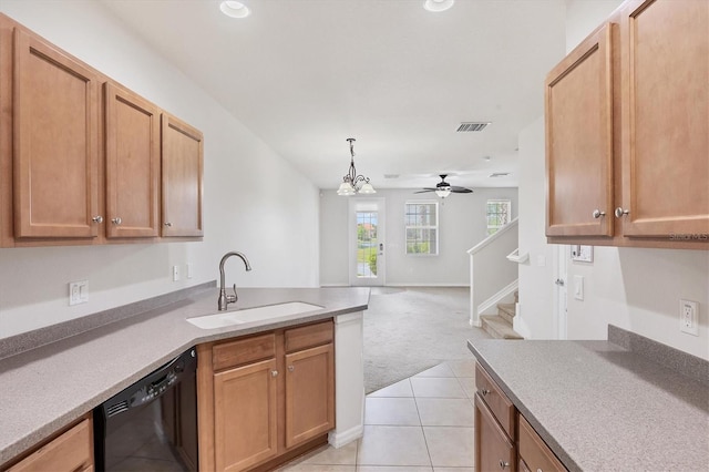 3760 82nd Avenue Cir E Unit 102, Sarasota, FL 34243 - kitchen with a sink, black dishwasher, light colored carpet, light tile patterned floors, and a ceiling fan