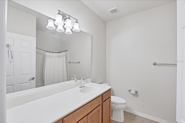 3760 82nd Avenue Cir E Unit 102, Sarasota, FL 34243 - bathroom featuring toilet, vanity, baseboards, tile patterned floors, and a shower with curtain