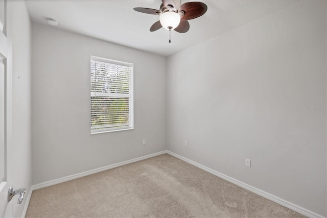 3760 82nd Avenue Cir E Unit 102, Sarasota, FL 34243 - carpeted spare room with a ceiling fan and baseboards
