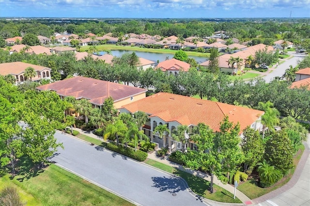 3760 82nd Avenue Cir E Unit 102, Sarasota, FL 34243 - aerial perspective of suburban area with a nearby body of water