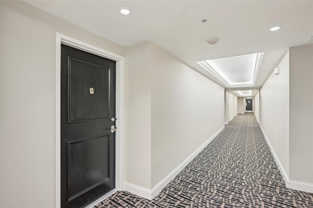101 S Gulfstream Ave Unit 6C, Sarasota, FL 34236 - hallway featuring baseboards, recessed lighting, and carpet flooring