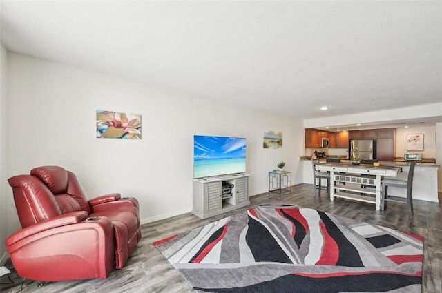 101 S Gulfstream Ave Unit 6C, Sarasota, FL 34236 - living area featuring wood finished floors, baseboards, and recessed lighting