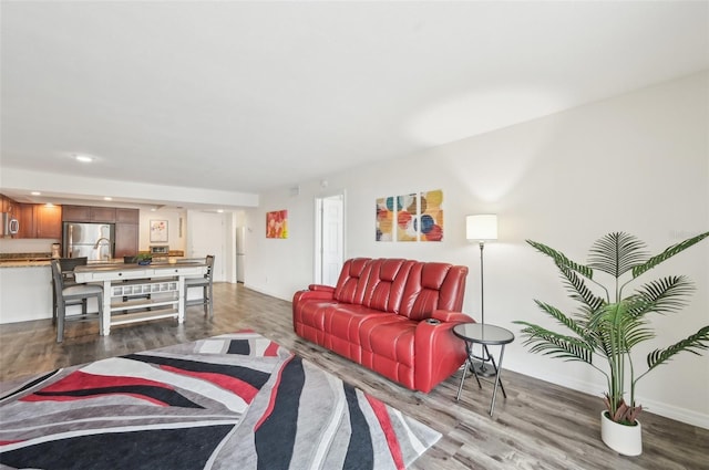 101 S Gulfstream Ave Unit 6C, Sarasota, FL 34236 - living room with wood finished floors, recessed lighting, and baseboards