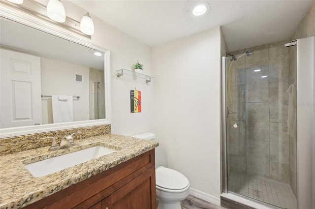 101 S Gulfstream Ave Unit 6C, Sarasota, FL 34236 - full bathroom with toilet, a shower stall, vanity, recessed lighting, and wood finished floors