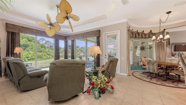 4920 Woodhurst Dr, Sarasota, FL 34243 - living area with ornamental molding, light tile patterned floors, ceiling fan, and a raised ceiling