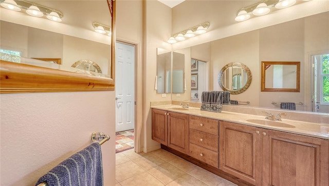 4920 Woodhurst Dr, Sarasota, FL 34243 - full bath with tile patterned flooring and double vanity