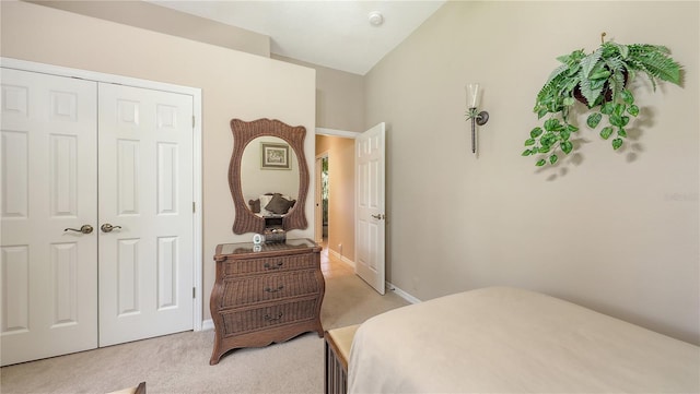 4920 Woodhurst Dr, Sarasota, FL 34243 - bedroom with light colored carpet, a closet, and baseboards