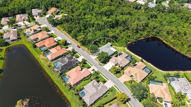 4920 Woodhurst Dr, Sarasota, FL 34243 - aerial overview of property's location with nearby suburban area and a nearby body of water