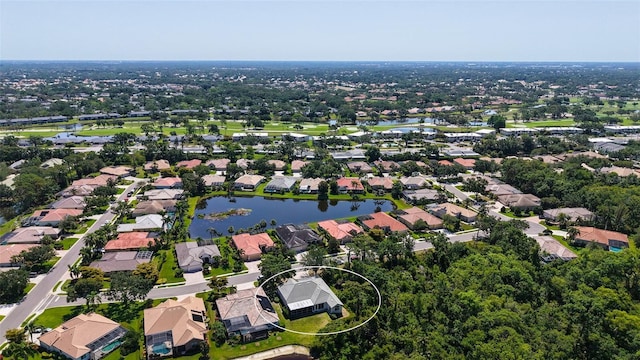 4920 Woodhurst Dr, Sarasota, FL 34243 - aerial perspective of suburban area with a large body of water