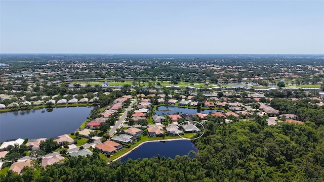 4920 Woodhurst Dr, Sarasota, FL 34243 - aerial perspective of suburban area with a nearby body of water