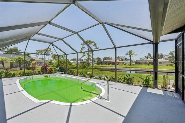 104 Hourglass Dr, Venice, FL 34293 - view of pool featuring a water view, a patio, a residential view, and a lanai