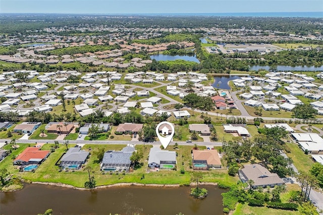 104 Hourglass Dr, Venice, FL 34293 - aerial view of property and surrounding area featuring nearby suburban area and a nearby body of water