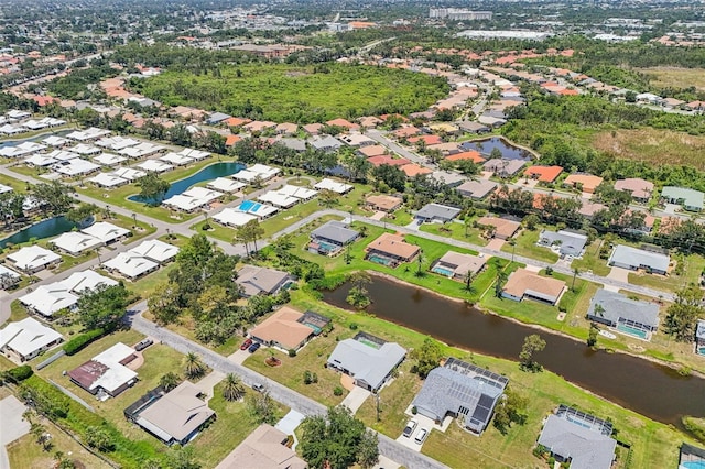 104 Hourglass Dr, Venice, FL 34293 - aerial overview of property's location featuring nearby suburban area and a nearby body of water