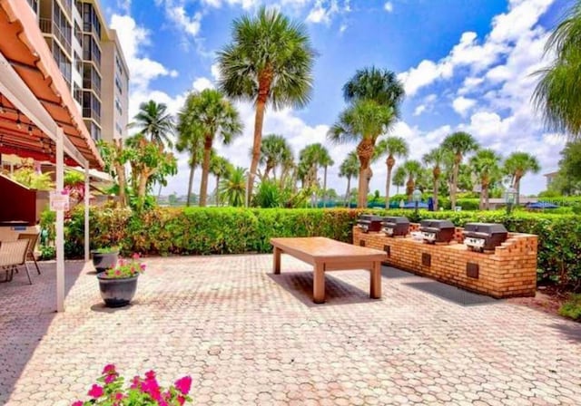 5855 Midnight Pass Rd Unit 621, Sarasota, FL 34242 - view of patio / terrace with a grill