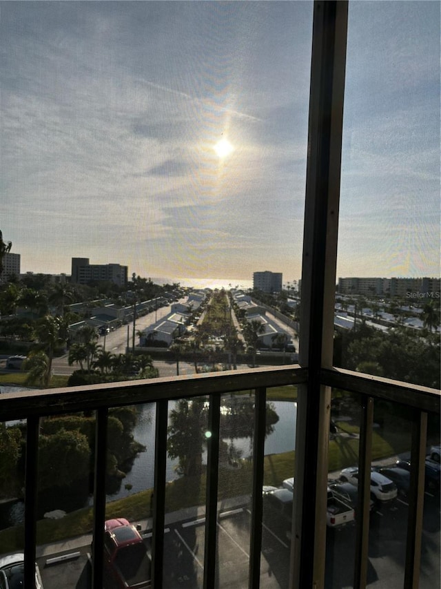 5855 Midnight Pass Rd Unit 621, Sarasota, FL 34242 - balcony at dusk featuring a city view