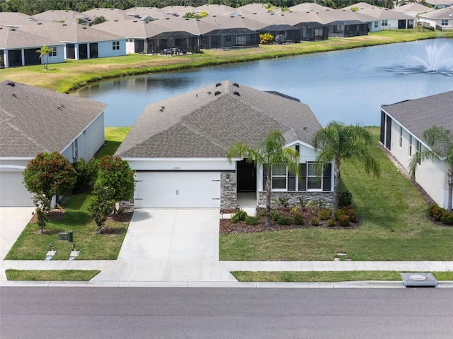 aerial perspective of suburban area with a large body of water