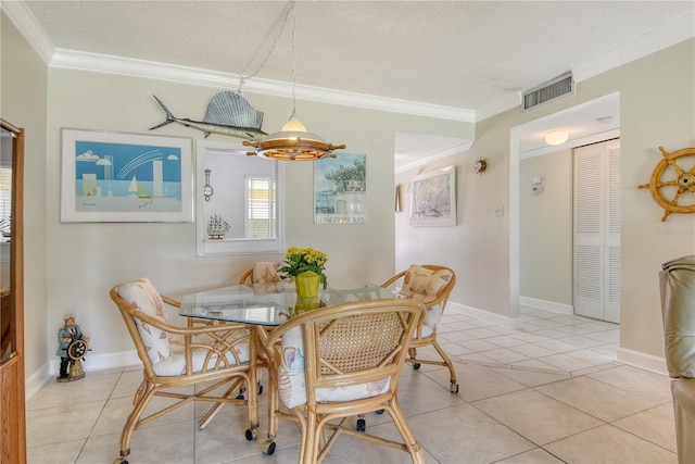 4840 Gulf Of Mexico Dr Unit 15, Longboat Key, FL 34228 - dining space with a textured ceiling, crown molding, light tile patterned floors, and a chandelier