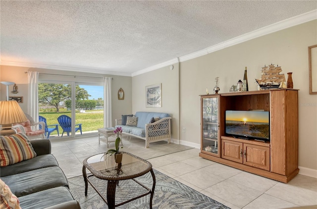 4840 Gulf Of Mexico Dr Unit 15, Longboat Key, FL 34228 - living area with crown molding, a textured ceiling, light tile patterned floors, and baseboards