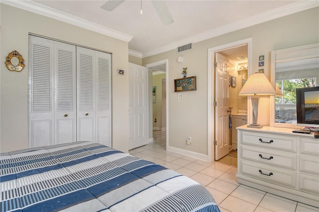 4840 Gulf Of Mexico Dr Unit 15, Longboat Key, FL 34228 - bedroom with ornamental molding, a closet, light tile patterned floors, baseboards, and a ceiling fan