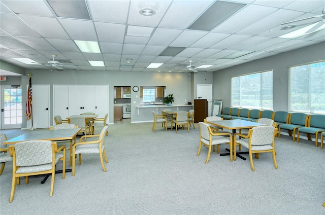 4840 Gulf Of Mexico Dr Unit 15, Longboat Key, FL 34228 - dining space featuring ceiling fan, light colored carpet, and a paneled ceiling