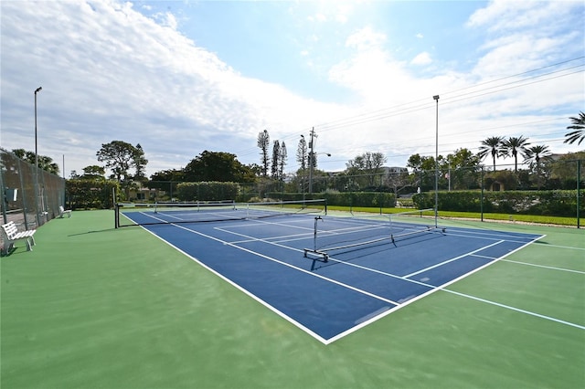4840 Gulf Of Mexico Dr Unit 15, Longboat Key, FL 34228 - view of tennis court with fence and community basketball court