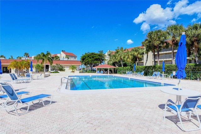 4840 Gulf Of Mexico Dr Unit 15, Longboat Key, FL 34228 - community pool featuring a patio and fence