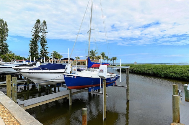 4840 Gulf Of Mexico Dr Unit 15, Longboat Key, FL 34228 - dock area with boat lift and a water view