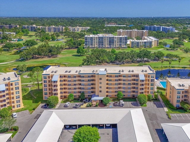 4550 Pinebrook Cir Unit 608, Bradenton, FL 34209 - bird's eye view of apartment complex, a local golf course, and a large body of water