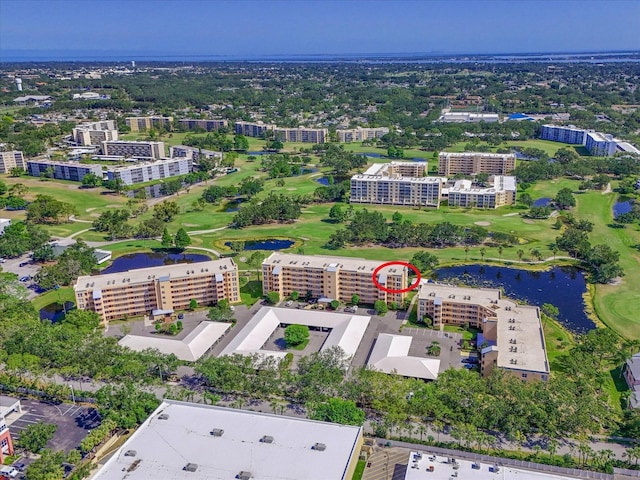 4550 Pinebrook Cir Unit 608, Bradenton, FL 34209 - aerial view of apartment complex / building, a golf course, and a large body of water