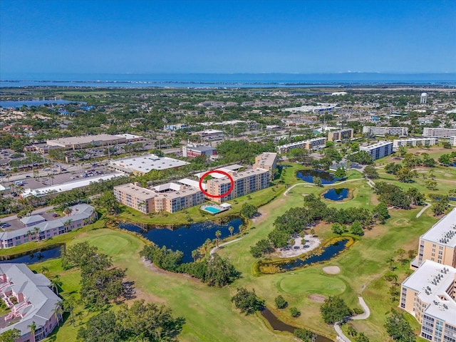 4550 Pinebrook Cir Unit 608, Bradenton, FL 34209 - bird's eye view of apartment complex, a nearby body of water, and a golf course