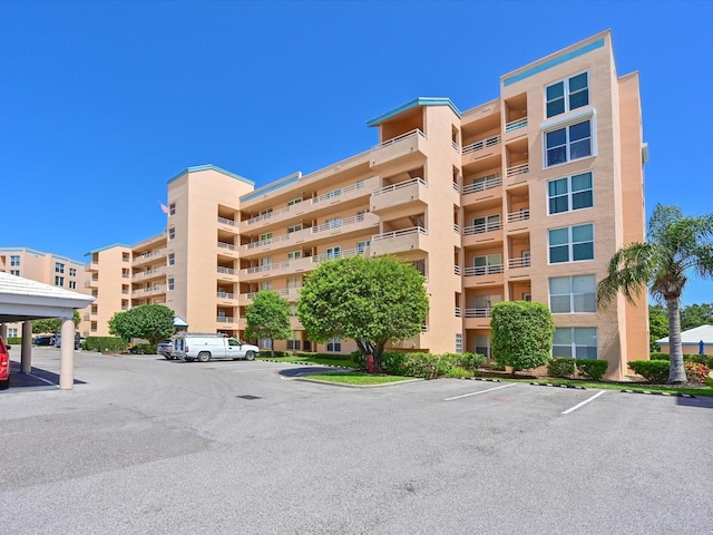 4550 Pinebrook Cir Unit 608, Bradenton, FL 34209 - view of apartment building / complex with uncovered parking