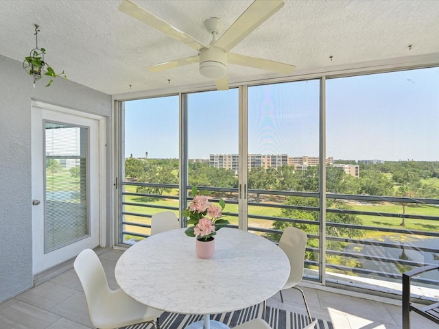 4550 Pinebrook Cir Unit 608, Bradenton, FL 34209 - sunroom / solarium featuring a textured ceiling and a textured wall