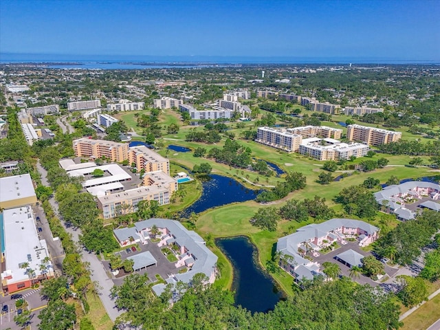 4550 Pinebrook Cir Unit 608, Bradenton, FL 34209 - drone / aerial view of a nearby body of water, apartment complex, and a local golf course