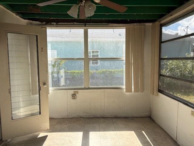 1758 35th St, Sarasota, FL 34234 - unfurnished sunroom featuring ceiling fan and plenty of natural light