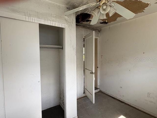 1758 35th St, Sarasota, FL 34234 - unfurnished bedroom with a closet and a ceiling fan