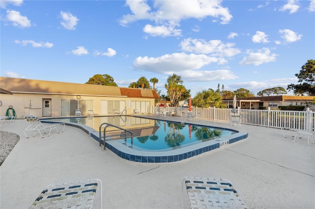 505 47th Avenue Dr W, Bradenton, FL 34207 - community pool featuring a patio and fence
