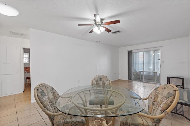 505 47th Avenue Dr W, Bradenton, FL 34207 - dining area featuring light tile patterned floors, ceiling fan, and plenty of natural light
