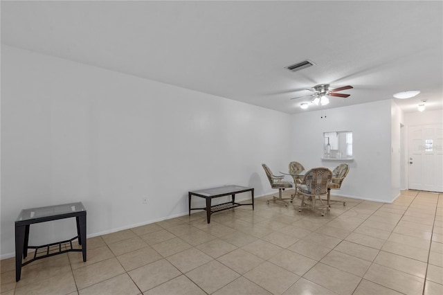 505 47th Avenue Dr W, Bradenton, FL 34207 - sitting room with ceiling fan, light tile patterned floors, and baseboards