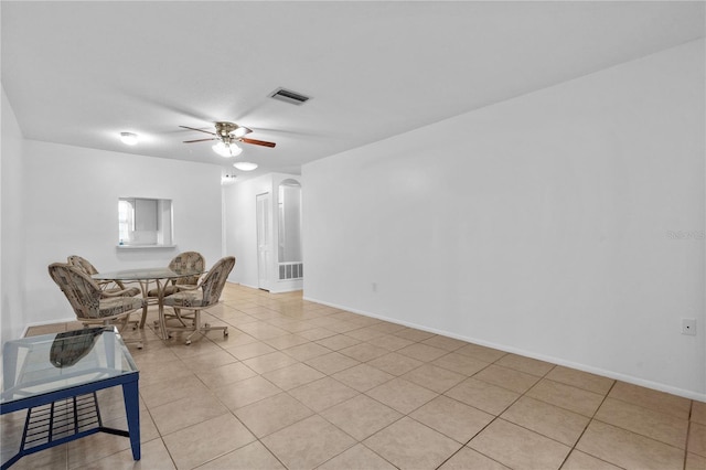 505 47th Avenue Dr W, Bradenton, FL 34207 - living room featuring light tile patterned floors, a ceiling fan, and baseboards