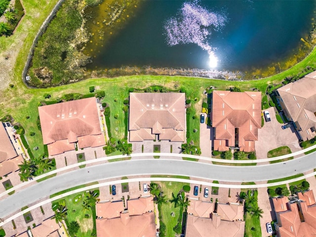 23528 Awabuki Dr Unit 101, Venice, FL 34293 - aerial view of property and surrounding area featuring a large body of water and nearby suburban area